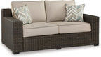 Signature Design by Ashley Coastline Bay Casual Weather Resistant Outdoor Loveseat with Cushion and 2 Throw Pillows, Nuvella Weather Resistant Fabric, Beige & Dark Brown