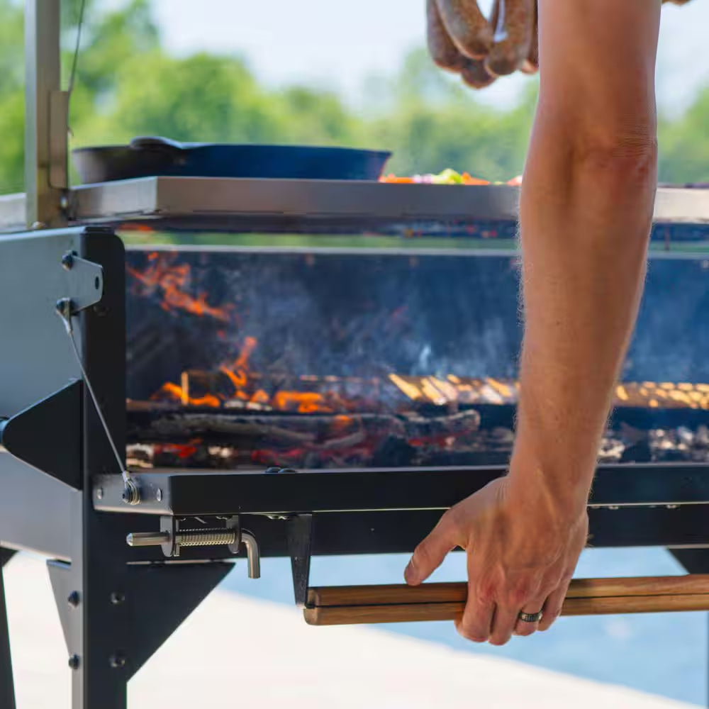 Heritage 4 Ft. X 2 Ft. Open-Fire Stainless Steel Santa Maria Argentine BBQ Grill with Adjustable Grill Grates in Black